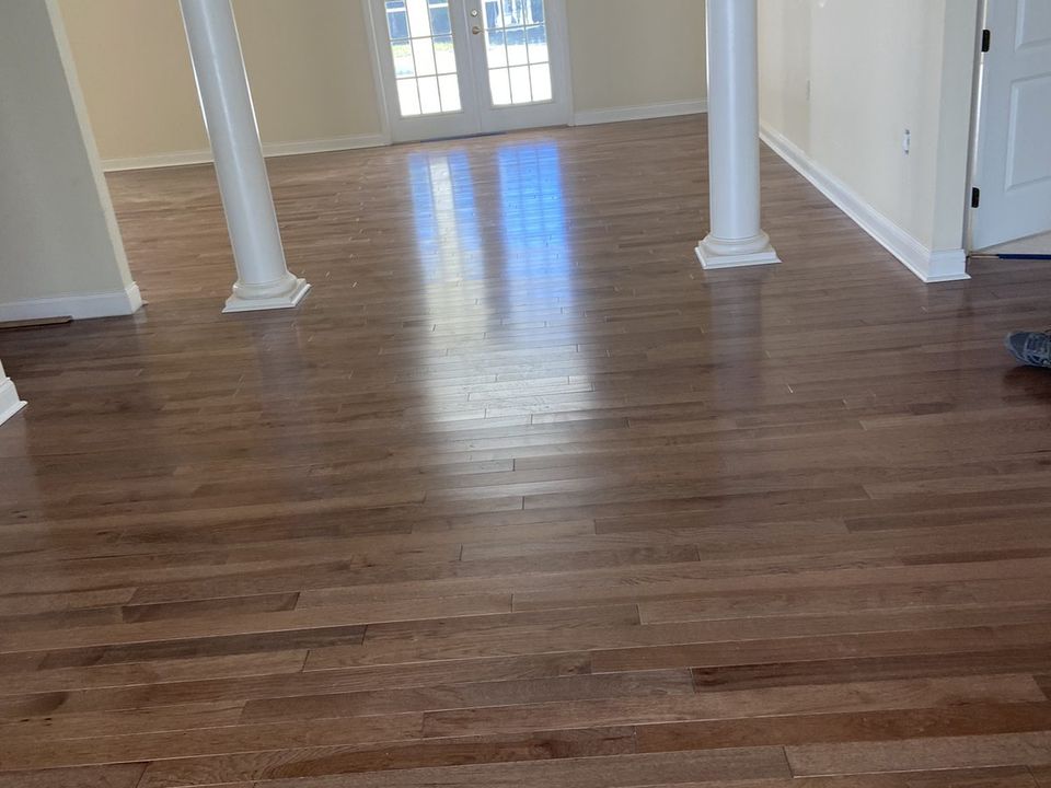 Engineered hardwood flooring installed over a concrete slab in a Sarasota-area home