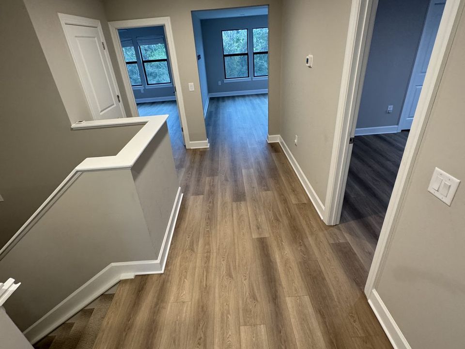 Luxury vinyl plank flooring installed in a Sarasota hallway