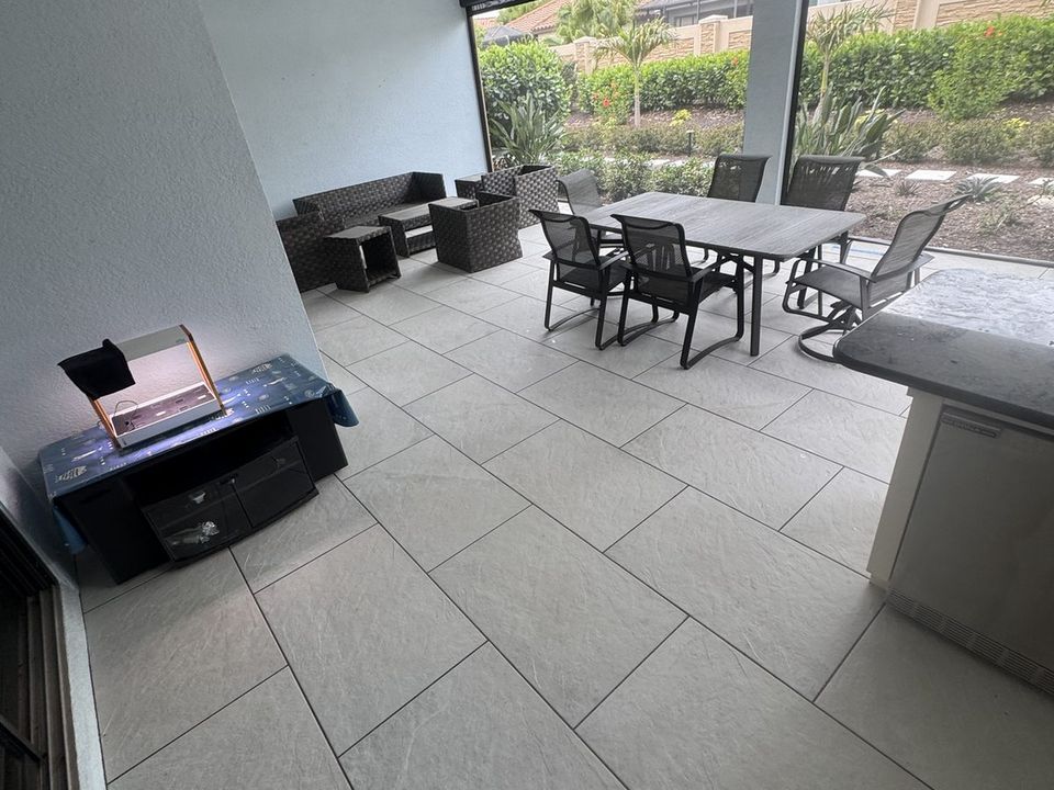 Large-format porcelain tile installation in a Sarasota home